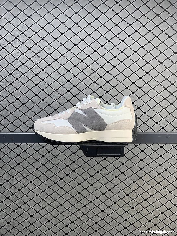 New Balance Gray Retro Runners Highlighting Road Runner Profile