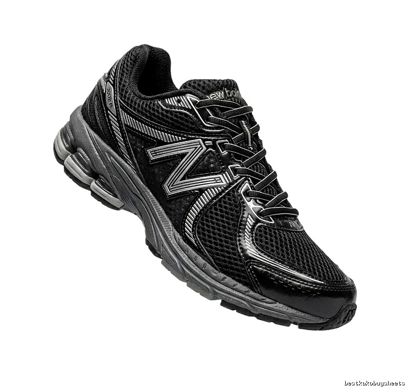 New Balance retro-style black and grey sports shoes