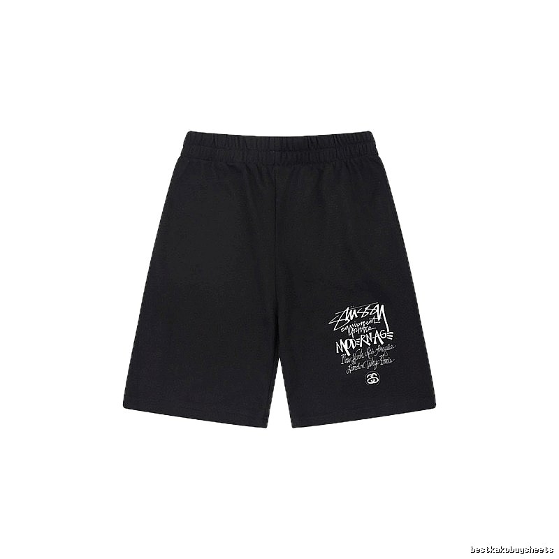 Stussy graffiti-style black shorts