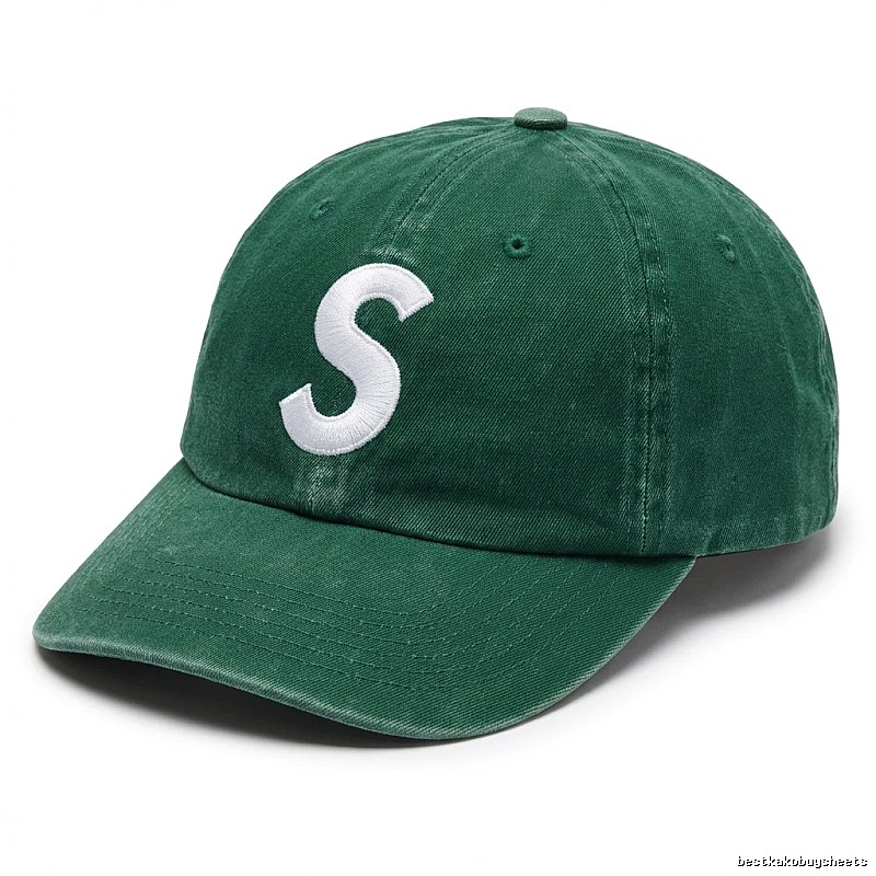 Vintage-style green hat with Supreme letters